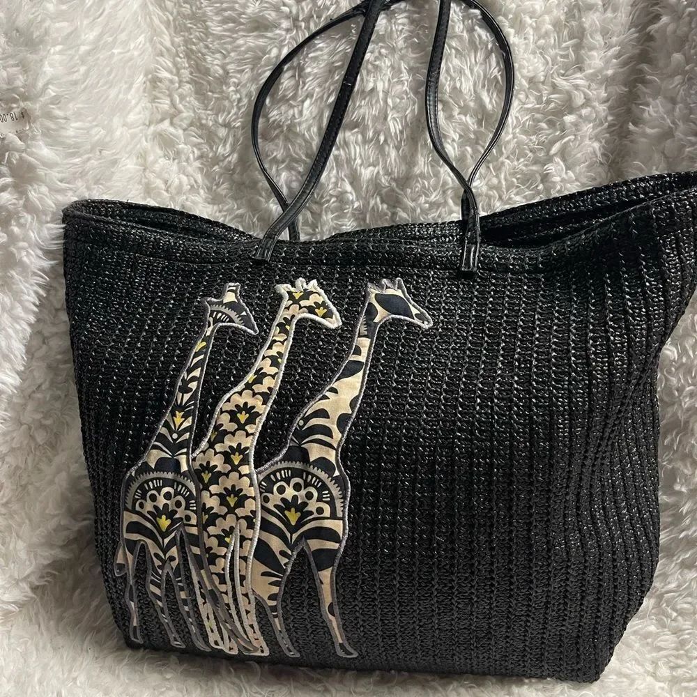 Vera Bradley Black Woven Tote Bag with Giraffe Appliqué accent.